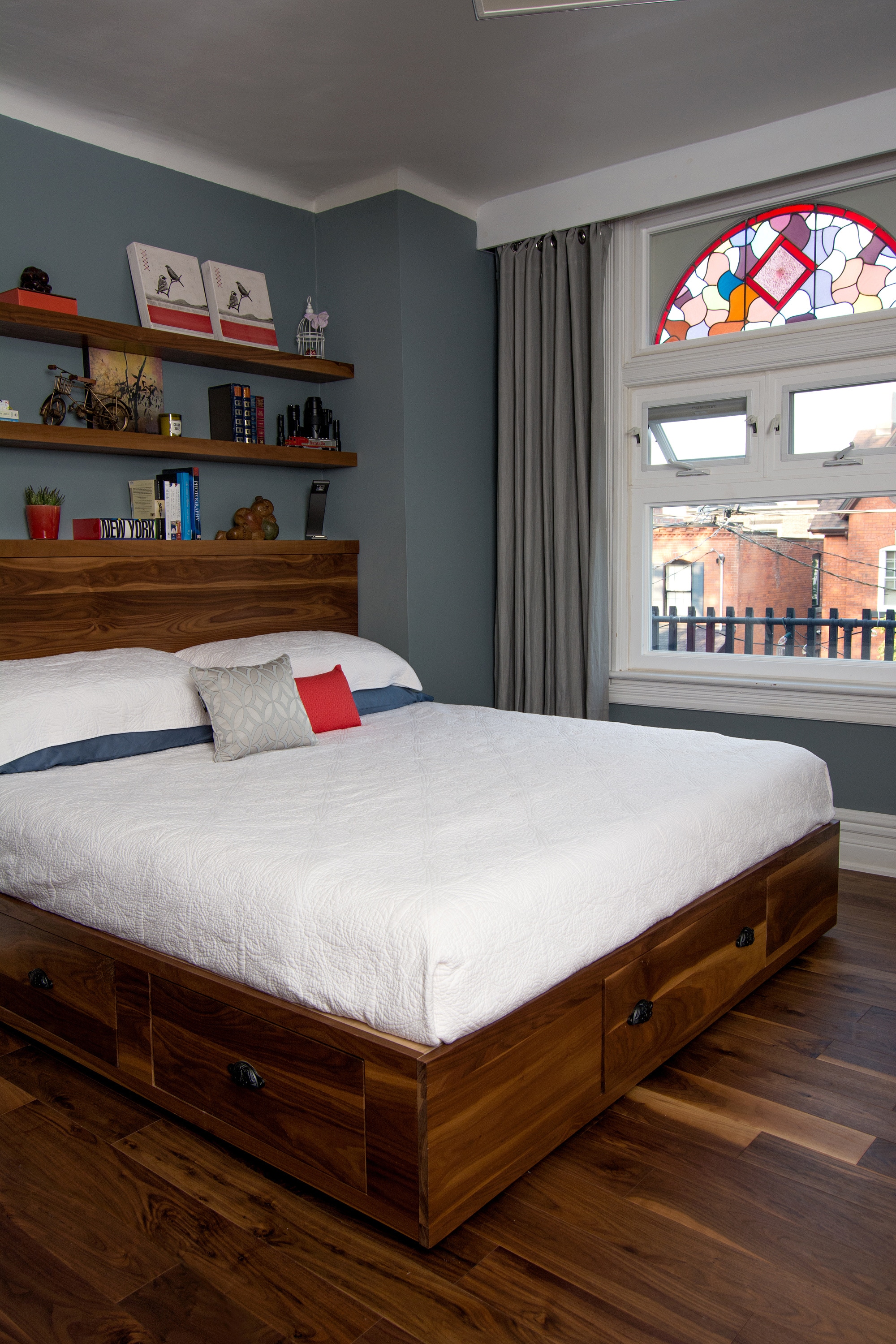 The stained glass window in my clients bedroom was our inspiration for the accent colours and accessories.
