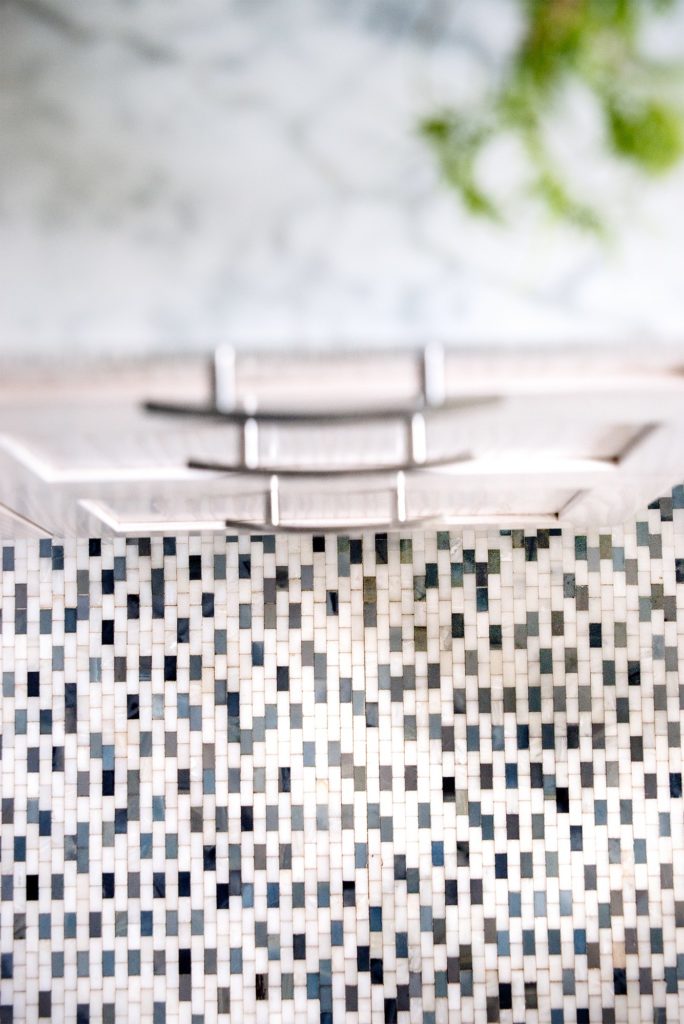 In this bathroom design Hannah Dee of Hannah Dee Interiors uses colourful 1"x2" subway tile on the floor 