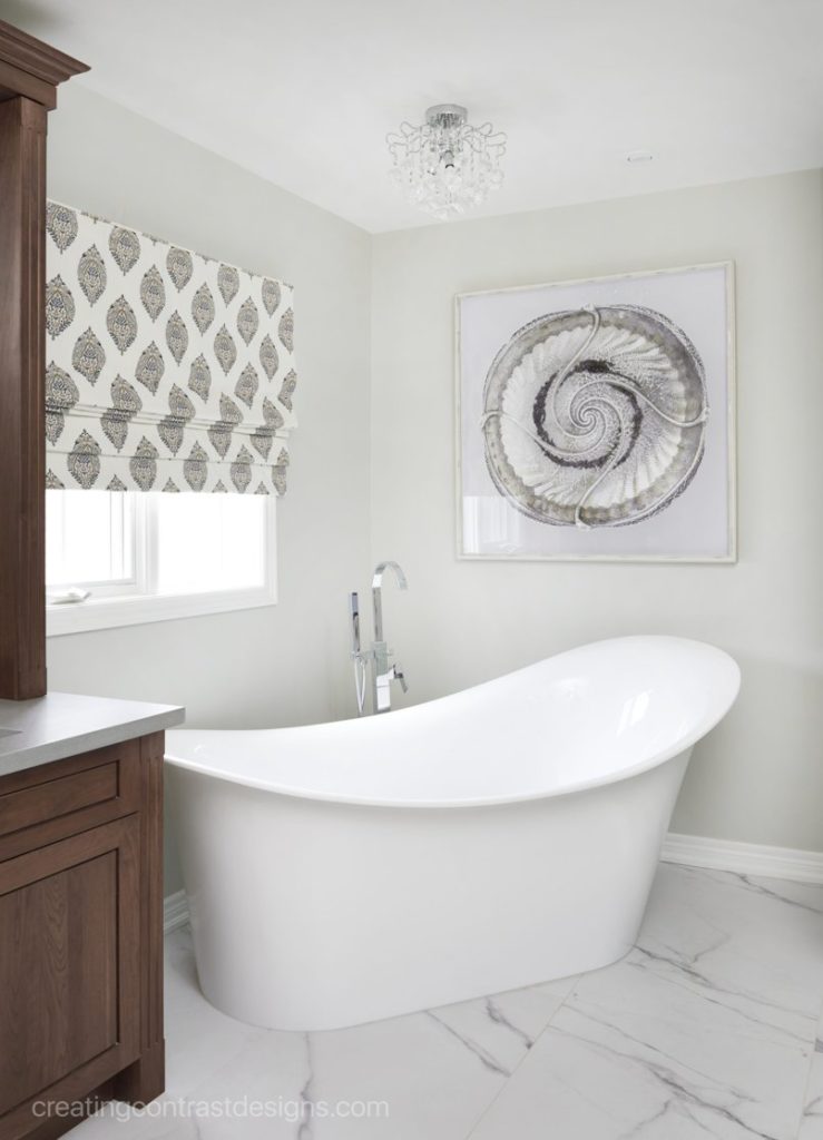 Ensuite Bathroom With Bathtub And Artwall With Window Treatment With Pattern