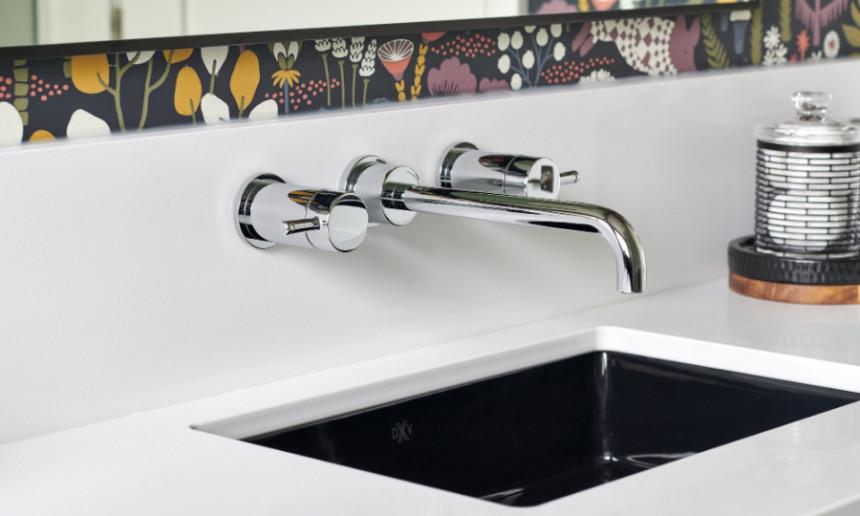 bathroom-with-chrome-wall-mounted-tap-and-faucets-black-undermount-sink-white-countertop