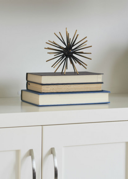 custom-cloud-white-cabinetry-detail-with-books-and-decorative-art
