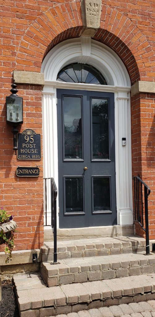 Dark Blue Ahle Navy Front Door Arched Red Brick Closer 1