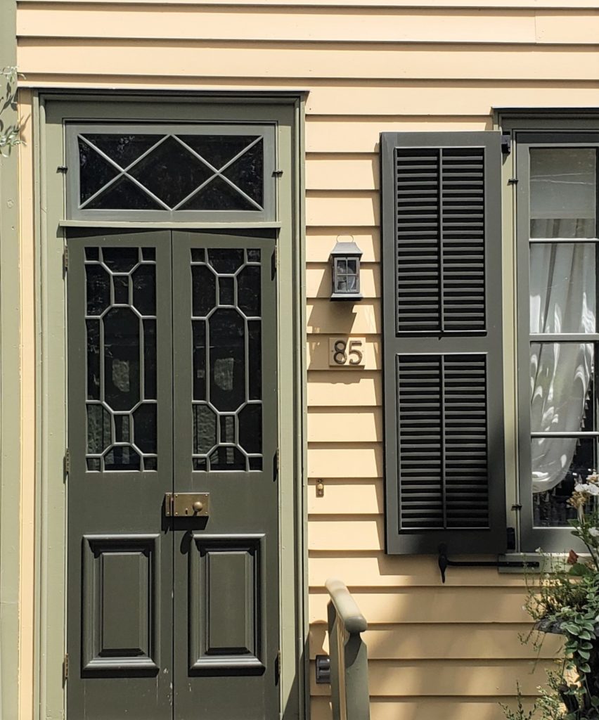 Studio Green Front Door Yellow House Close Up Fb 1