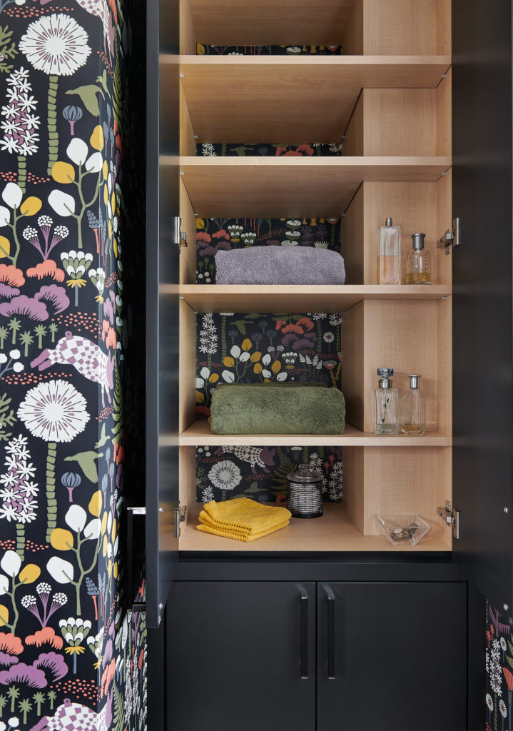 Black Bathroom Custom Cabinet With Shelves And Wallpapered Background