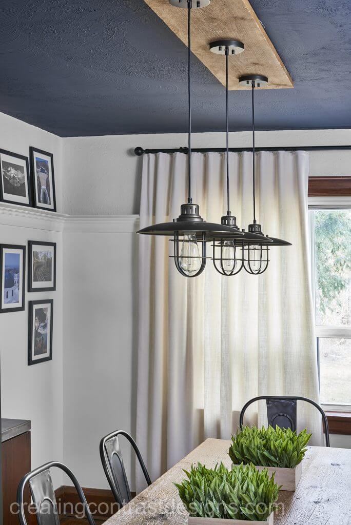 Benjamin Moore Hail Navy Painted Ceiling With Metal Pendant Lights And Ripple Fold White Drapery