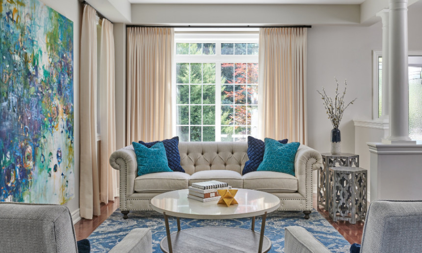 formal-living-room-custom-drapery-balboa-mist-benjamin-moore-bold-art-round-coffee-table