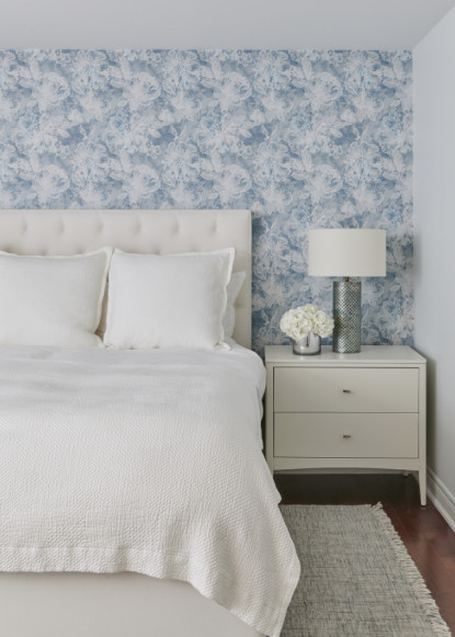 master-bedroom-with-wallpaper-white-upholstered-bed-white-nightstand-blue-and-white-color-palette