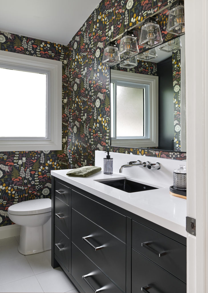 Small Bathroom White Counter Black Vanity Colorful Wallpaper