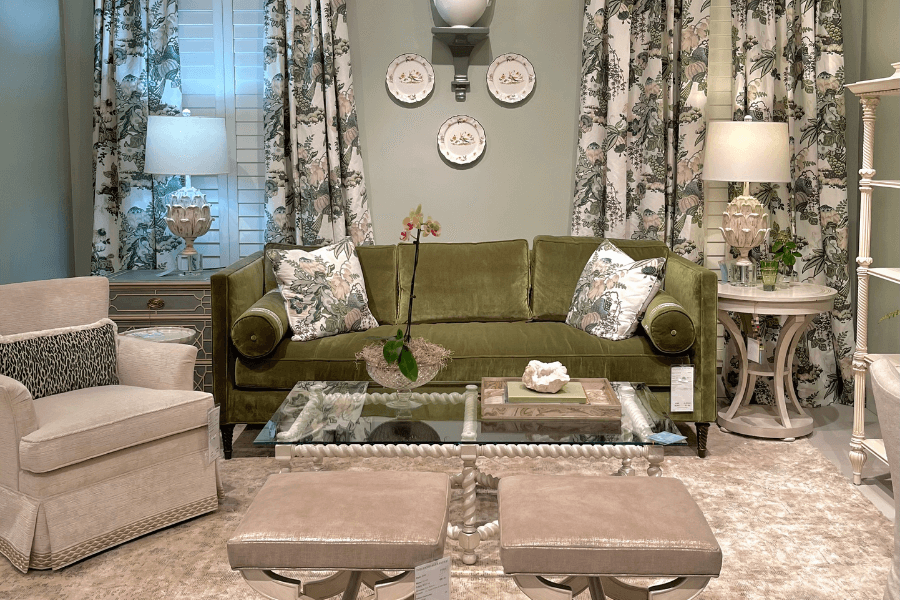 Olive Green sofa, blush armchair, pink armchair, leather stools, sage green walls, custom drapery