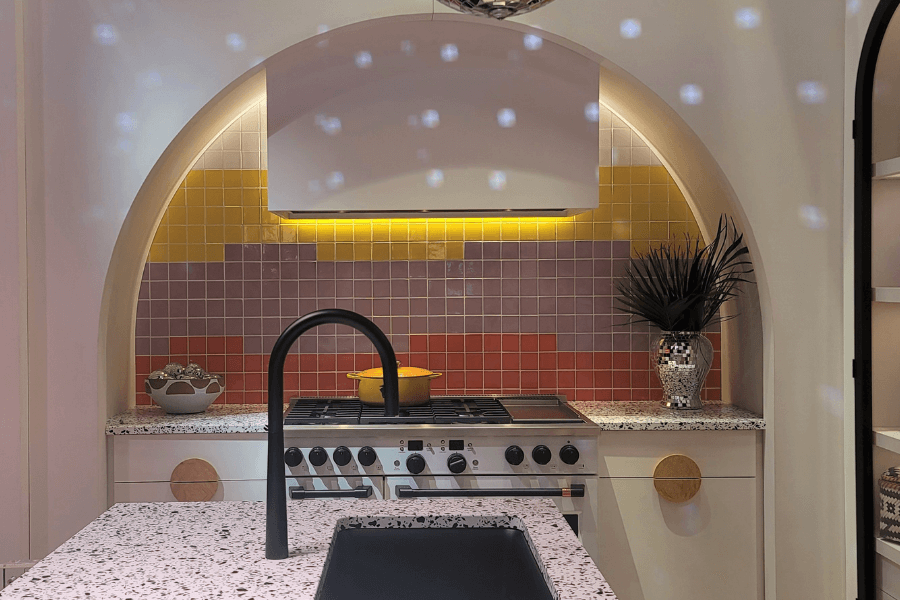 Curved Archway, kitchen design, terracotta tiles, Monogram appliances, KBIS, Monogram booth, black faucet