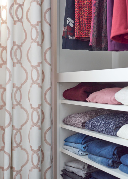 organized-closet-folded-sweaters-open-shelving