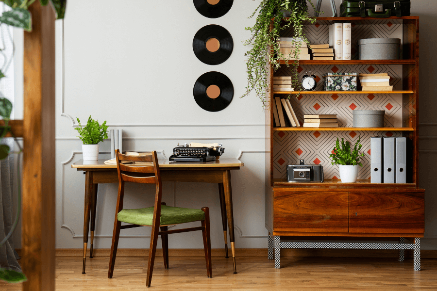 dark wood toned bookshelf, mcm desk, mid century desk chair