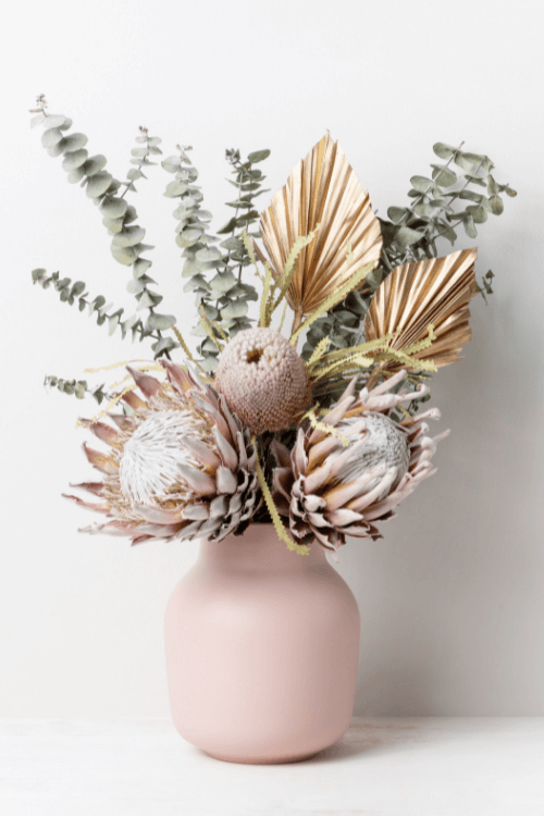 dried flowers, palm fronds, pink vase, boho flowers