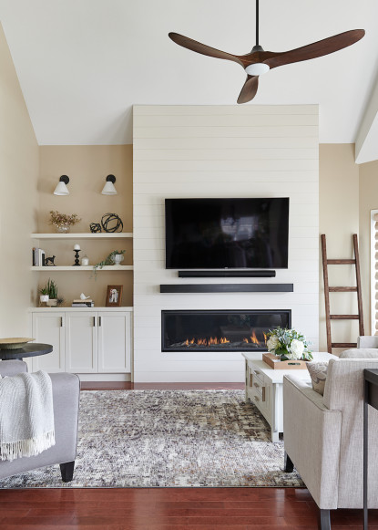 benjamin-moore-white-down-shiplap-fireplace-floating-mantle-angled-ceilings
