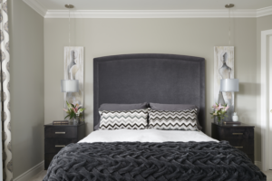 Master Bedroom In Revere Pewter By Benjamin Moore With Upholstered Gray Headboard